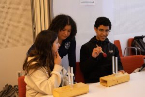 Students explore resonances with tuning forks.