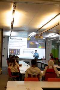 Students are shown a presentation on spectroscopy.